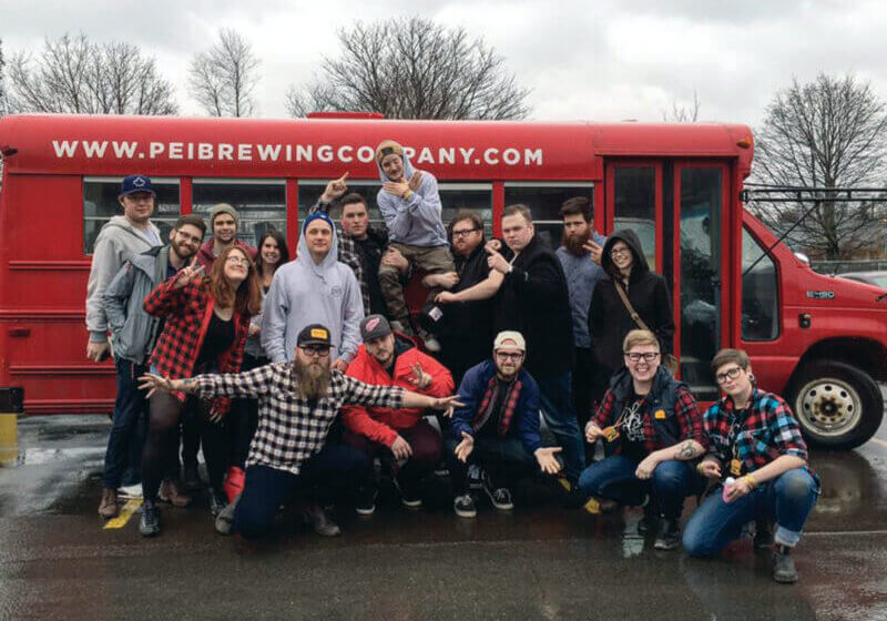 Al Douglas and friends pose in front of the Burger Bus during Burger Love 2016