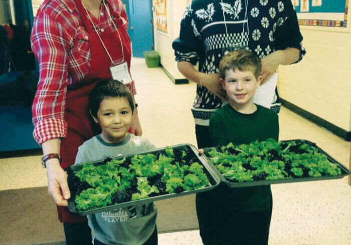 Prince Street School kindergarten students and their garden buddies preparing kale chips.//Submitted Photo