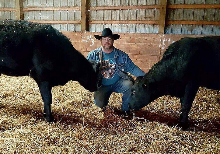 Jason Lutz at his family farm in Bedeque, where his cattle feed on spent grains from Upstreet.
submitted photo: Upstreet Craft Brewing