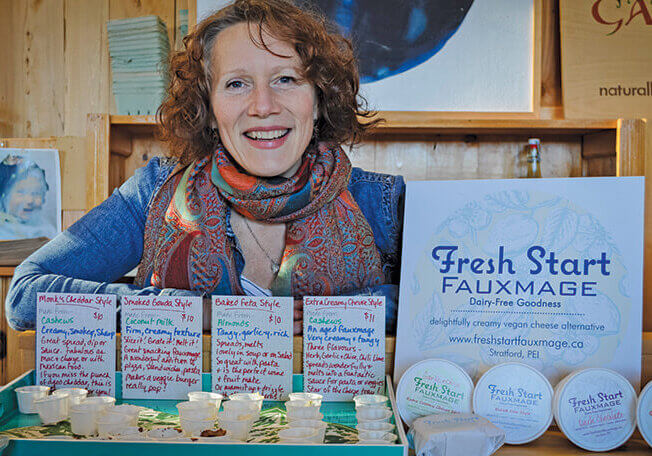 Julain Molnar poses with an assortment of her fauxmage samples at the Charlottetown Farmers Market